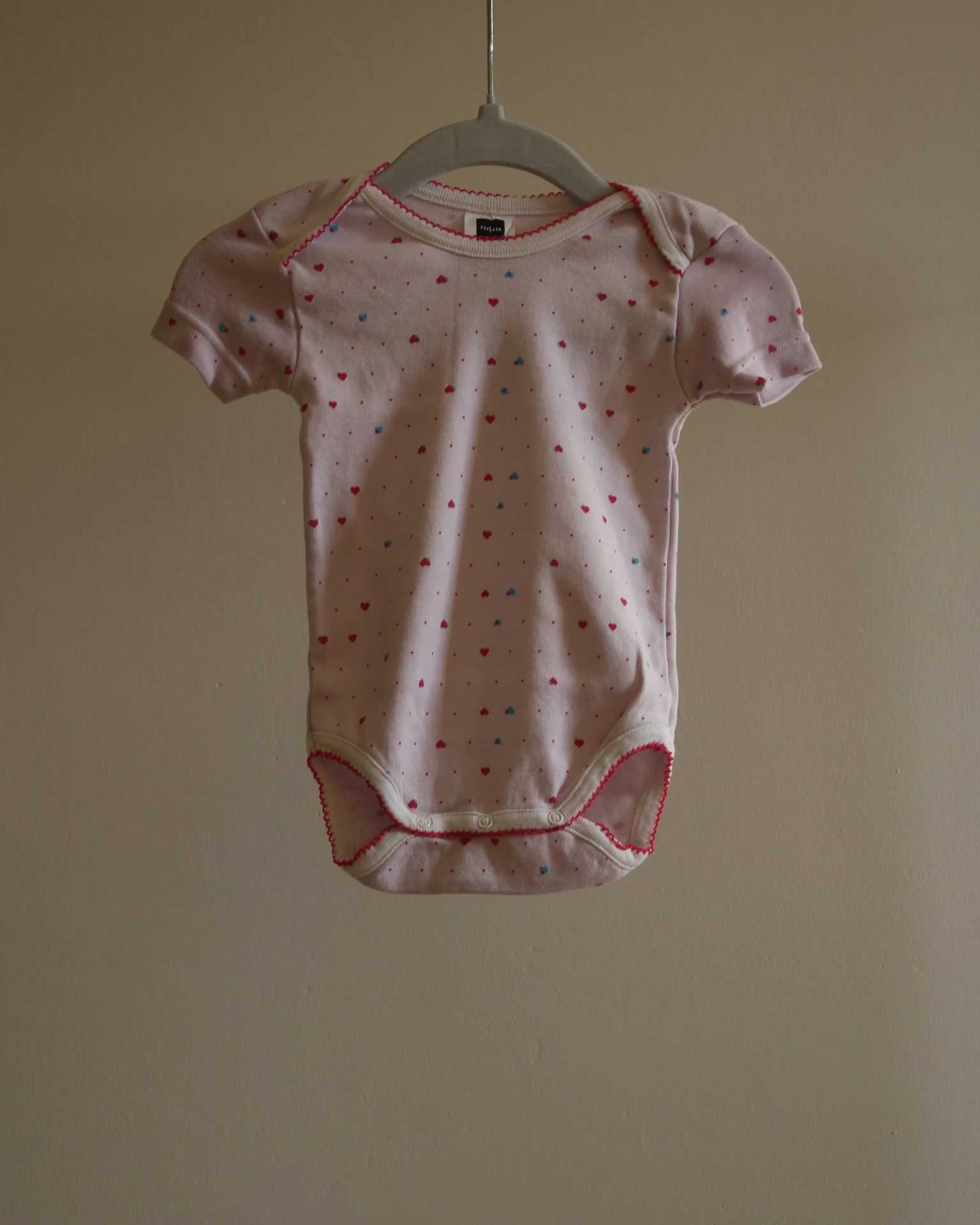 Body rose clair manches courtes